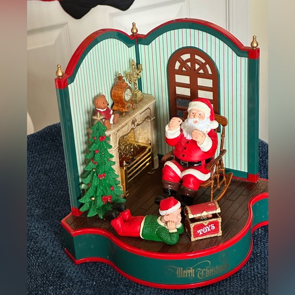 Cute Santa scene. Santa rocks and an elf looks at a box of toys. Missing cord. - Picture 5 of 12